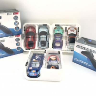 3 X Boxed Scalextric Wireless Controllers and 6 Cars.