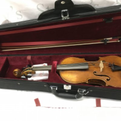 A William Beale 1840 Violin and bow in a fitted case . An interesting antique violin possibly 19th century by William Beale Manchester dated 1840 but may well be a German factory instrument , as a copy of the English, labelled inside the body.