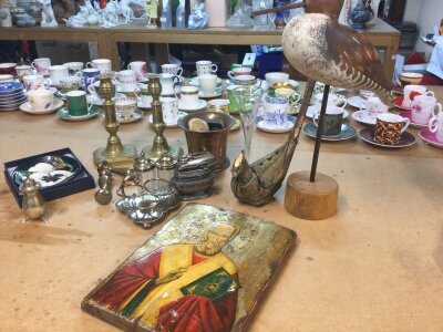 A modern icon, decoy duck, Silver hallmarked shaker, brass pair of candlesticks , boxed Moorcroft dish etc
