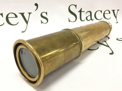 A good quality four drawer brass telescope by T .Cook of London no1842. 28cm long,  86cm long fully extended