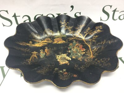 A Victorian paper mache oval dish with Chinese figures and scenery, 35cm wide.