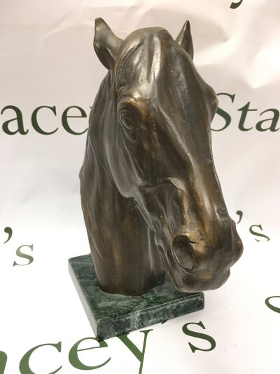 A large bronze horses head bust , 29cm tall.