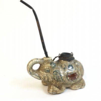 A Chinese crackle glazed porcelain elephant opium smoking pipe . Dimensions 9cm tall 15cm long approximately- NO RESERVE