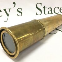 A good quality four drawer brass telescope by T .Cook of London no1842. 28cm long,  86cm long fully extended