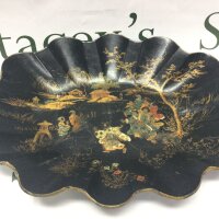 A Victorian paper mache oval dish with Chinese figures and scenery, 35cm wide.