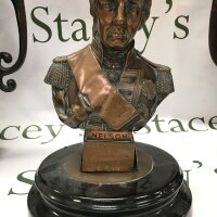 A small bronze and copper bust of Nelson, 20cm tall approximately