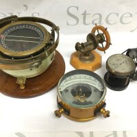 A nautical compass and other instruments.