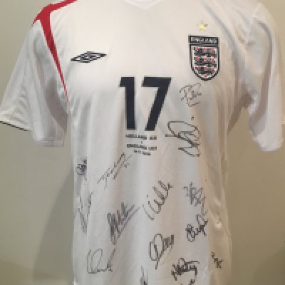 2006 England U21 Signed Match Issued Football Shirt: England shirt signed by 14 players brought back by Peter Barnes the Tottenham + West Ham club secretary who travelled with the team. Number 17 with Holland U21 v England U21 14 11 2006 printed under number. Please note this was a spare and not used in match. England players in this match were Carson Hoyte Baines Davies Kilgallon Huddlestone Routledge Milner Whittingham Nugent Young Walcott and Jerome.
