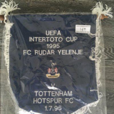 1995 Radar Yelenje v Tottenham Exchange Football Pennant: Intertoto Cup match played on 17 1995. Very large pennant measuring 18 inches high with Tottenham embossed badge to centre with match details either side. Not commercially available.