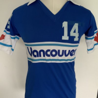 Vancouver Whitecaps 1981 Match Worn Football Shirt: Excellent condition very rare away shirt made by Penmans. Number 14 to front, rear and sleeves. Both sleeves have the Canadian flag. Medium size attractive shirt has Taylor to rear. The NASL dissolved in 1984 with many participating teams going the same way. COA from Alan Taylor.
