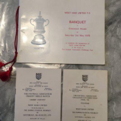 1975 West Ham Football Players Menus: Programme of Arrangements for the FA Cup final and the Charity Shield both played at Wembley. C/W banquet menu at Grosvenor House the evening of match signed inside by Lock Jennings Holland Day and director Cearns. Former property of Alan Taylor who was awarded the golden boot by Jimmy Hill. Excellent condition. (3)