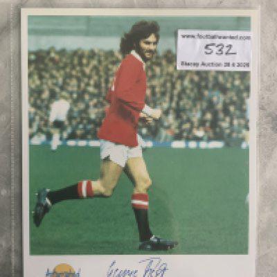 George Best Manchester United Autographed Editions Signed Photo: Stunning large card from reputable company Autographed Editions. Depicts Best in Manchester United kit with a lovely clear undedicated autograph to lower border. Rear has his career details.