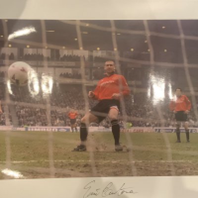 Manchester United Big Blue Tube Signed Football Prints: All measuring nearly 23 x 17 inches in excellent condition produced by the famous company with genuine autographs on prints which there are print runs of only 500. Includes two different of Cantona plus Schmeichel, Giggs and Van Nistelrooy. (5)