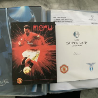 Manchester United Football Menu Collection: Superb collection from the 1990s kept in two purpose made binders embossed Manchester United Menus. Covering players such as B Robson Ray Wood Alex Stepney and Ryan Giggs. Good menus from the 1999 Super Cup Final plus the odd one signed including Best and Law. 32 menus with slight duplication.