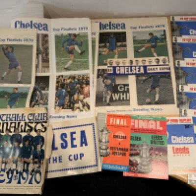 Chelsea Football Memorabilia Box: Many items regarding the 1970 FA Cup final including 7 mint condition replay programmes, Evening News posters, newspapers, brochures and more. Other papers and memorabilia included.