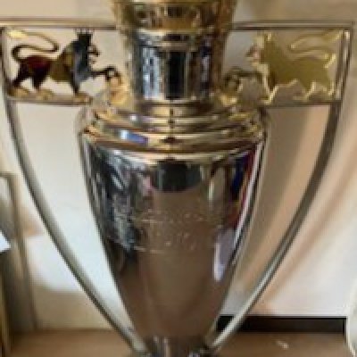 Premier League Football Trophy: Excellent replica trophy measuring 50cm high and 24cm across at widest point. Look great in bar with red ribbons on this year. Realistic looking trophy is about half the size of the original.