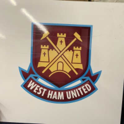 West Ham Large Football Signed From Upton Park: We are informed this was removed from the Bobby Moore suite at Upton Park after its closure. White background with castle and hammers famous emblem. Measures 38 x 38 inches. Not for posting.