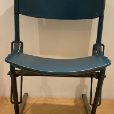 Old Wembley Football Stadium Original Seat: Not many whole seats made it out of the old Wembley after its closure in 2001. There was a contract for some seat backs to be removed though. This is the whole seat cut where it entered concrete. A stand has been made for it to slot into so its fully useable in a man cave or museum. Blue seat still has number 54 and has original blue paint.