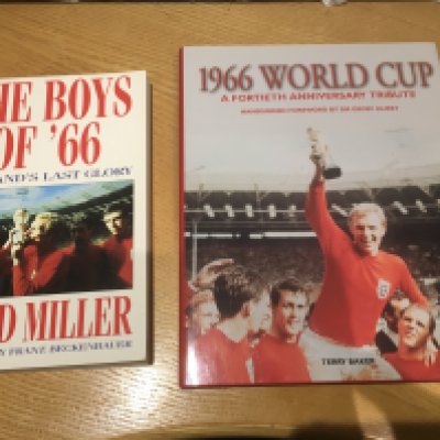 England 1966 World Cup Signed Football Books: Boys Of 66 soft cover by David Miller signed by Gordon Banks Martin Peters Geoff Hurst and Jimmy Greaves. Hardback 40th anniversary of the 1966 World Cup by Terry Baker with autograph of Geoff Hurst. (2)