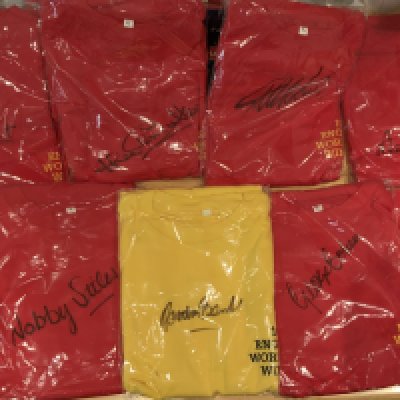 England 1966 World Cup Winners Signed Football Shirts: Red long sleeve large red shirts with the words 1966 World Cup Winners embroidered to breast. Each of the 9 shirts is hand signed without dedication and comes with a COA from a reputable source. Players include Cohen Ball Hurst Peters Stiles Wilson Hunt J Charlton and a yellow shirted Banks. Mint condition. (9)