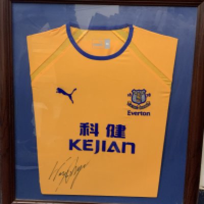 Rooney Everton Signed Framed Away Football Shirt: Yellow 2003/04 away shirt signed by Rooney clearly in marker pen. Nicely framed with blue backing card. Not for posting.