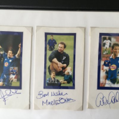 Leicester City Football Autographs: Folder containing 65 undedicated signed pictures mainly on magazine pictures of players from the 90s and 2000s. C/W a large poster of the 2000 Worthington Cup final signed by Matt Elliott.