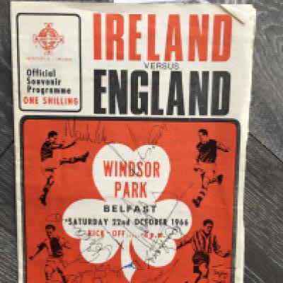 1966 England Signed Football Programme: Just 3 months after winning the World Cup this away programme at Ireland is signed to cover. Autographs include Bobby Moore, Martin Peters Peter Bonetti Jimmy Greaves and a few journalists.