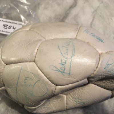 1978 England Signed Football: White deflated panelled ball with around 18 autographs in green biro. Includes Shilton Latchford Brooking Corrigan Coppell Keegan Neal Kennedy and many more. A few are beginning to fade but all legible.