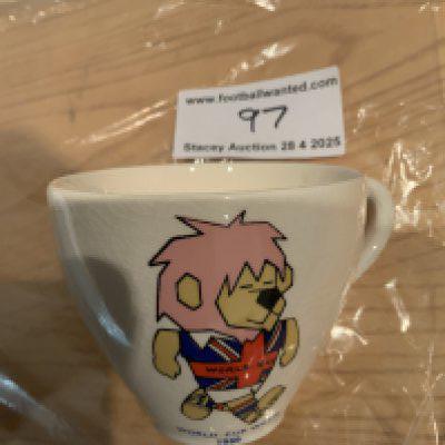 1966 World Cup Willie Tea Cup: Stunning condition and never used with Willie looking very bright above the words World Cup Willie 1966. Underneath has Football Association Washington Pottery of Stoke makers mark.