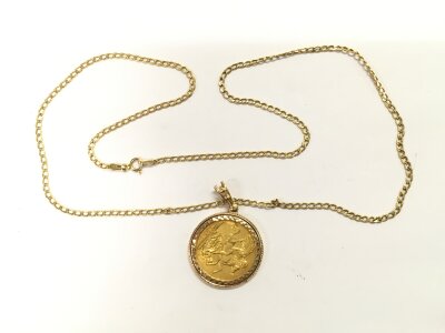 An 1894 sovereign in a 9ct gold mount and suspended on a 9ct gold chain, approx total weight 13g.