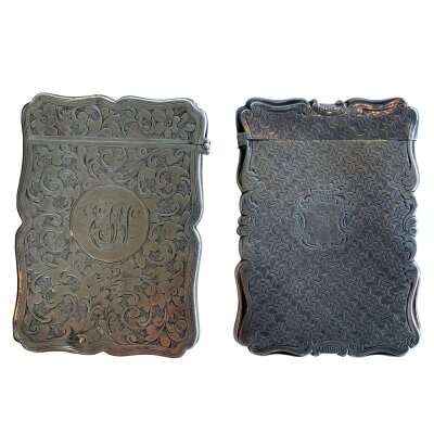 2 hallmarked silver visiting card cases with engraved decoration. 130.7g