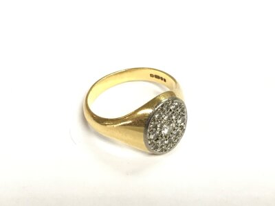 An 18ct gold cluster ring, approx 13g and approx size X-Y.