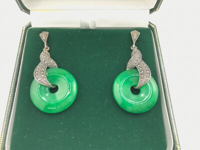 A pair of jadeite earrings in fitted box.
Approximately 52mm long and 25mm wide, NO RESERVE