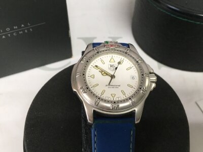 A boxed Tag Heuer WF1112-0 watch with booklets etc. Has had a recent full service at a cost of £300.