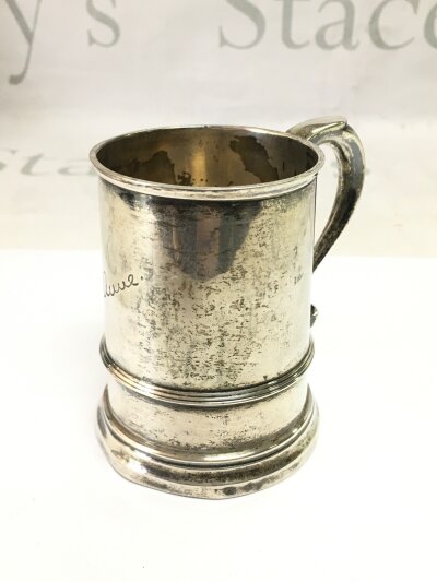 A small silver tankard, Birmingham hallmarks, approx 9cm in height.