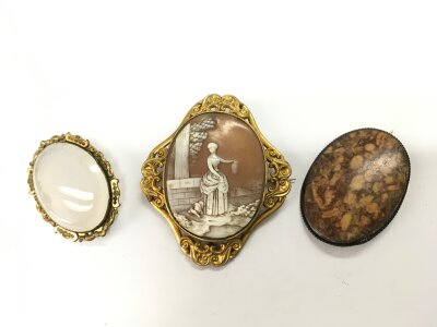 Three Victorian brooches including one cameo example, approx length 8cm.