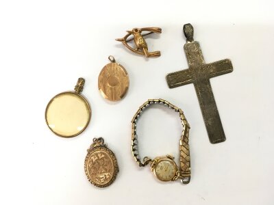 A small collection of vintage jewellery including a 9ct gold cased watch, lockets etc.