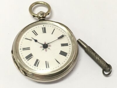 A silver hallmarked fob watch, with key, seen working