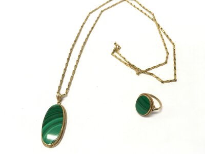 A 9ct gold matching malachite ring and pendant on a gold plated chain