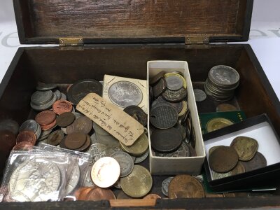 A collection of British and world coins including an 1881 dollar, 1797 cartwheel penny, Florins, Shillings etc