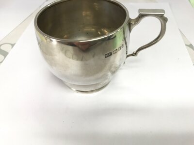 A small silver cup from Mappin and Webb 
129.40g