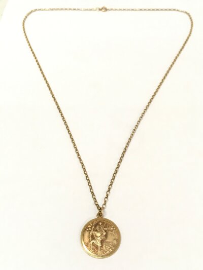 A 9ct gold St Christopher pendant on necklace 32cm long.