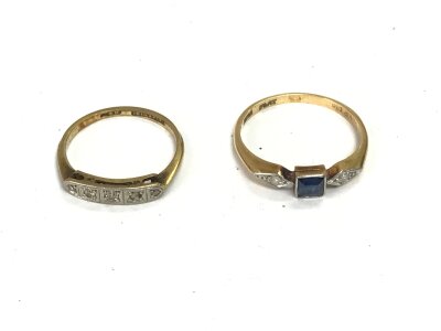 Two 18ct gold and platinum rings set with various stones. 4.10g