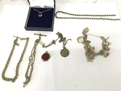 A Collection of assorted silver a white metal items including a lovely charm bracelet 57g