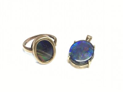 A 9ct gold dark opal ring and pendant, approx total weight 8.7g.