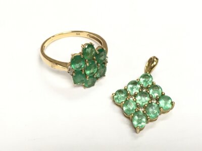 A 9ct gold light green emerald pendant and ring, total approx 5.5g.