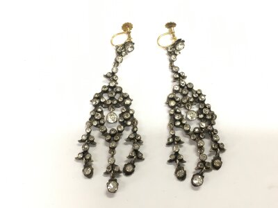 A pair of quality early Victorian drop earrings set with paste stones and gold screw fixings.
