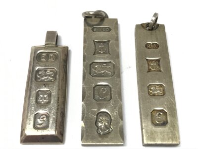 Three silver hallmarked ingot pendants. 45g. No reserve