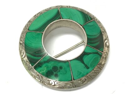 A Victorian silver and hard stone brooch. 5cm wide