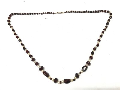 An antique garnet and Pearl necklace , gold clasp